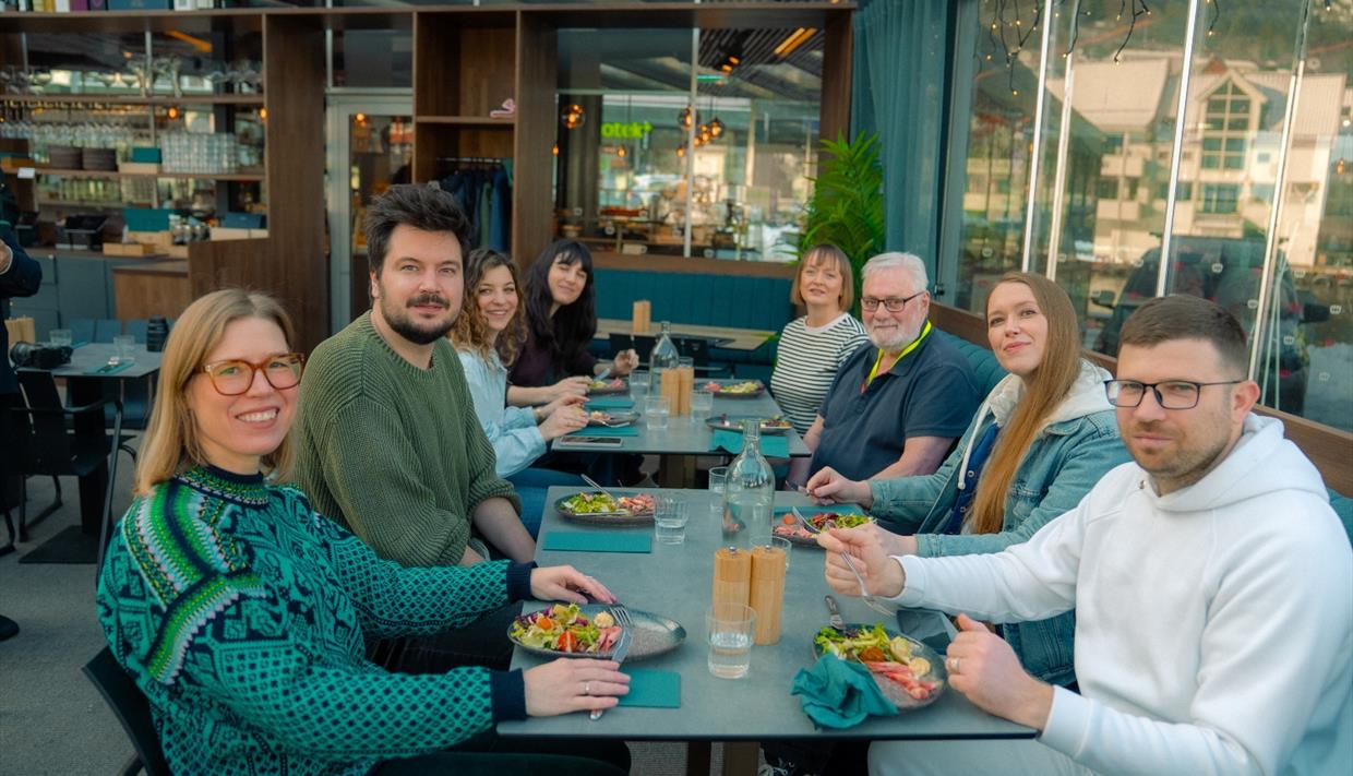 Happy participants on the food tour: A taste of Bergen