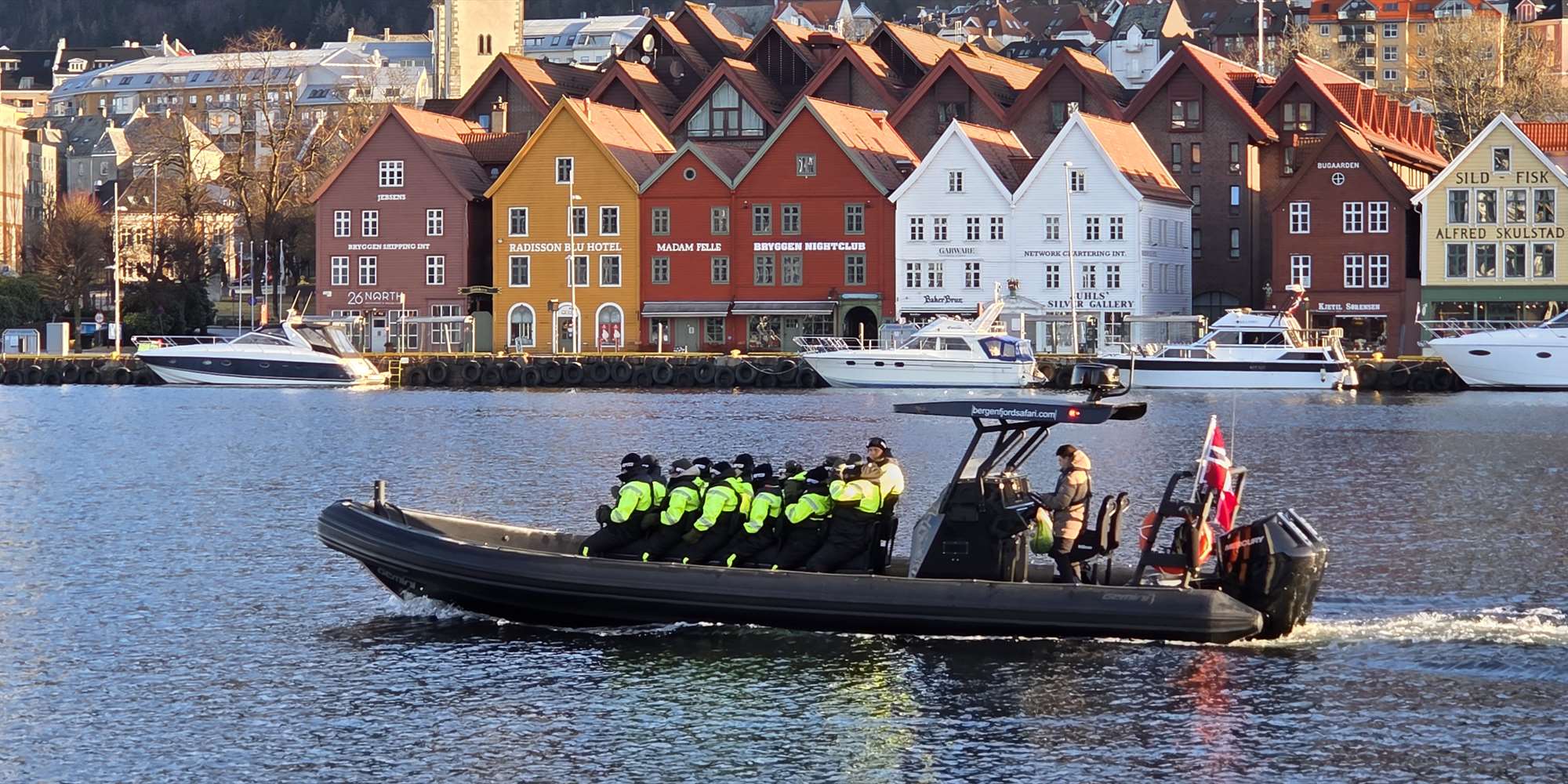 Rib-boat with Bryggen in Bergen in the background