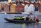 Rib-boat with Bryggen in Bergen in the background
