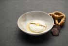 Menu item: Rømmegrøt - A traditional celebratory dish unlike anything you've tried before