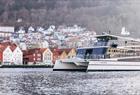 Bergen City Cruise passing in front of Bryggen